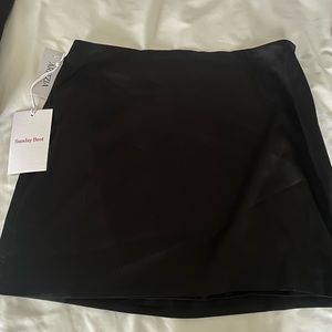 Black Aritzia mini skirt